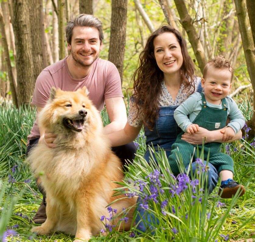 Husband Gearóid Maguire, Bianca and son Jude with the family dog.