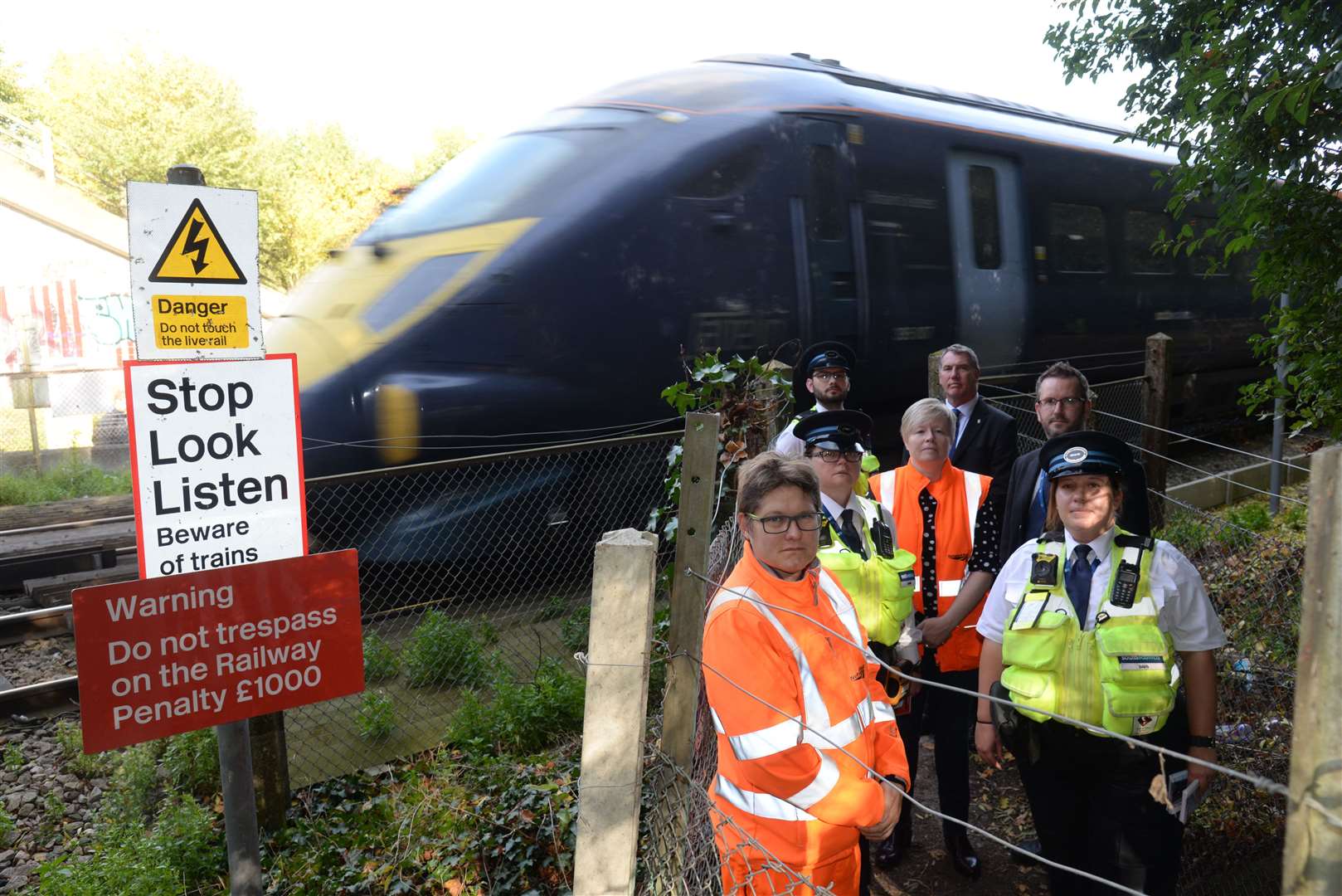 Network Rail and Southeastern staff along with Cllr Mike Whiting at Simpsons Level Crossing at Bobbing in 2017.
