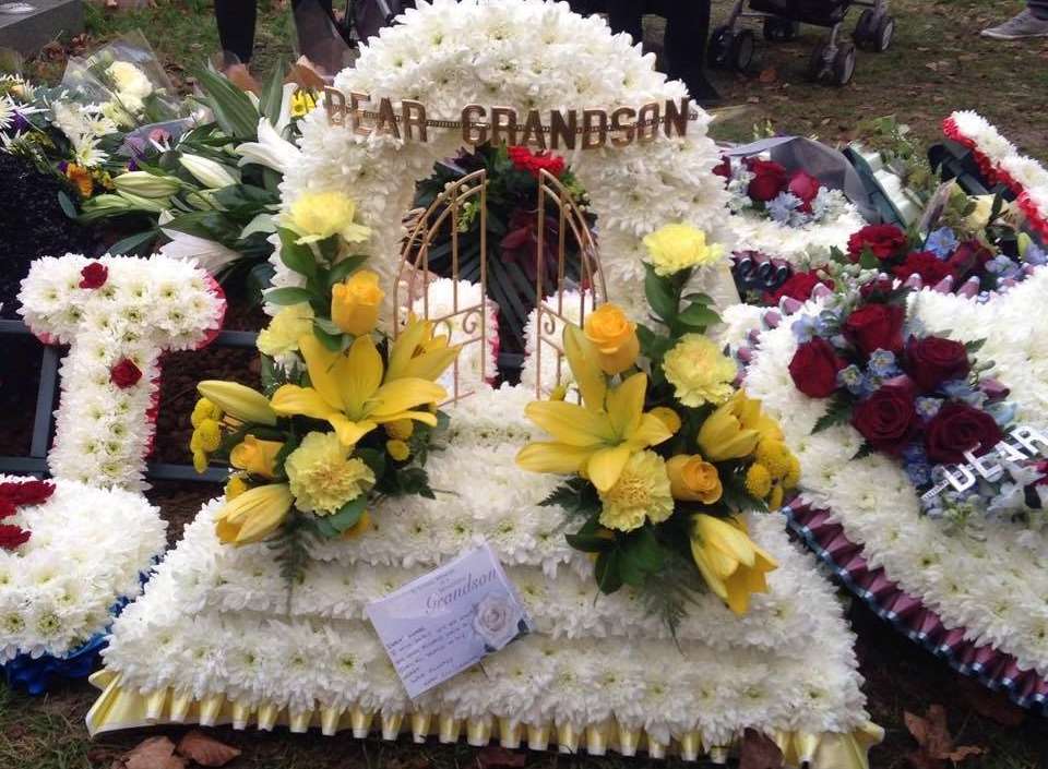 Floral arrangements laid in honour of Luke