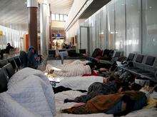 Youngsters from the Noise on Sheppey sleeping at Moscow airport
