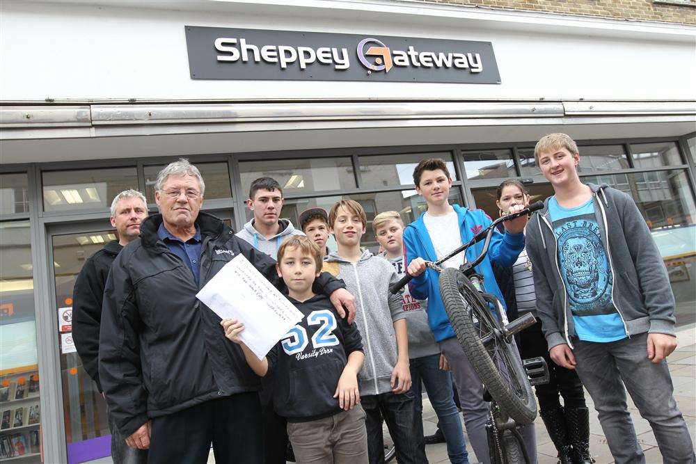 Nick Darkens, vice chairman, Brian Spoor, secretary of SEAL (Sheerness Enhancement Association for Leisure) with Ethan Darkens, nine, holding up a petition, for a purpose built skatepark