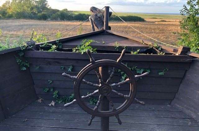 At the bottom of the garden in The Wheatsheaf, the seating area has been designed to look like the prow of a ship with a view across the fields to the sea