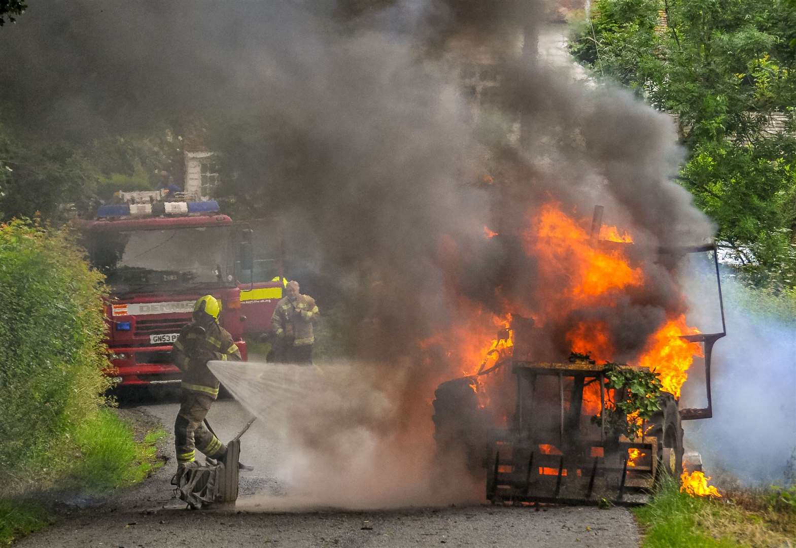 A brave firefighter close to danger. Picture Chris Lawson - Lawsonpics.com