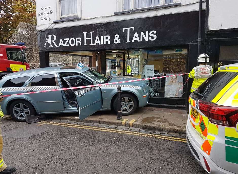 The taxi has crashed into the front of the hairdressers. Picture: Andrew Tutty