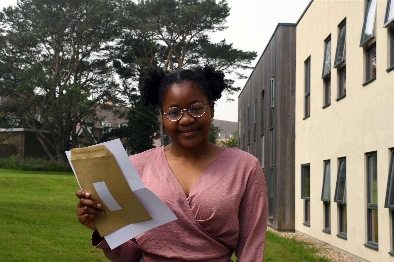 Ruth Adewole shows her A level marks. Picture: Duke of York's Royal Military School