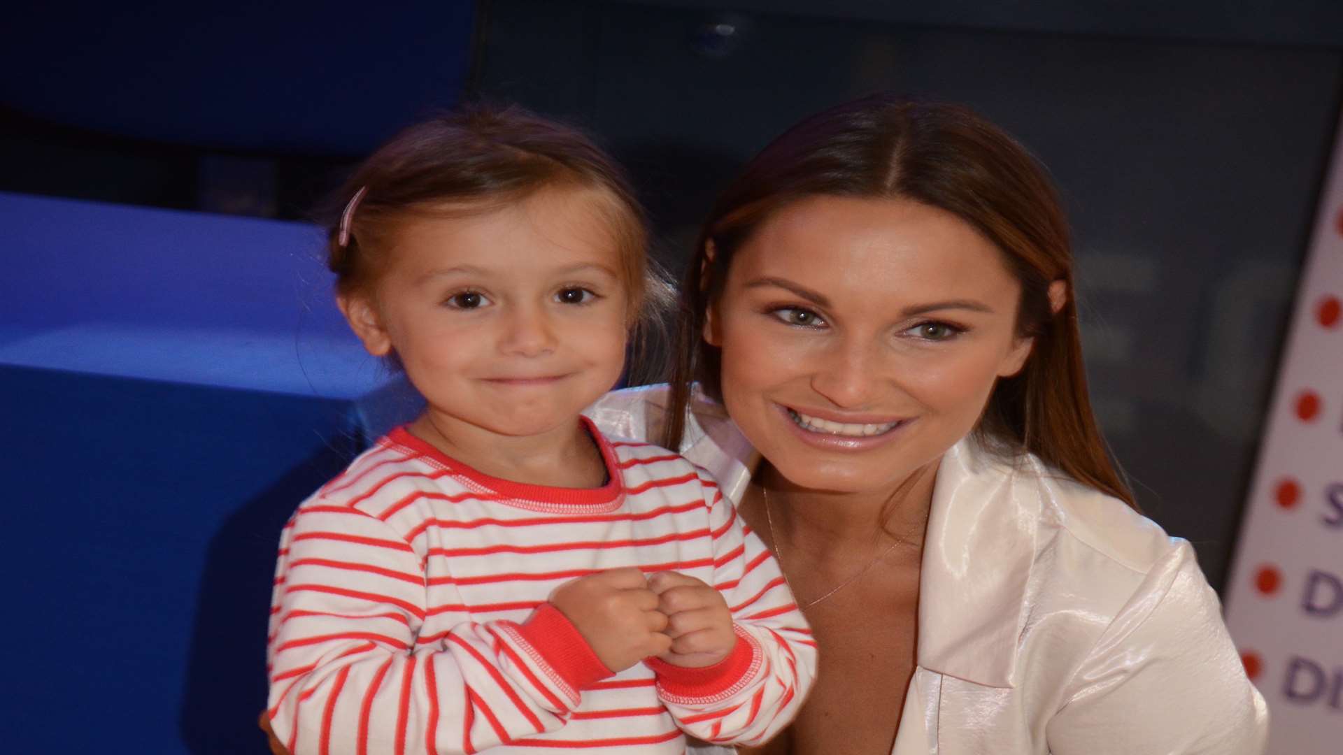 Sam Faiers with fan Ella White, 4, at the Lockmeadow launch