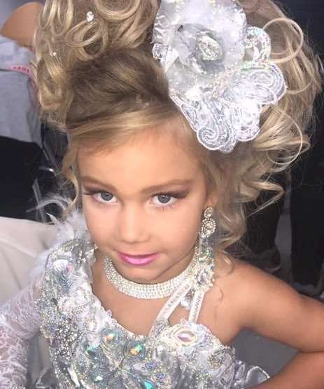 Four-year-old Arielle dressed for one of the beauty pageants