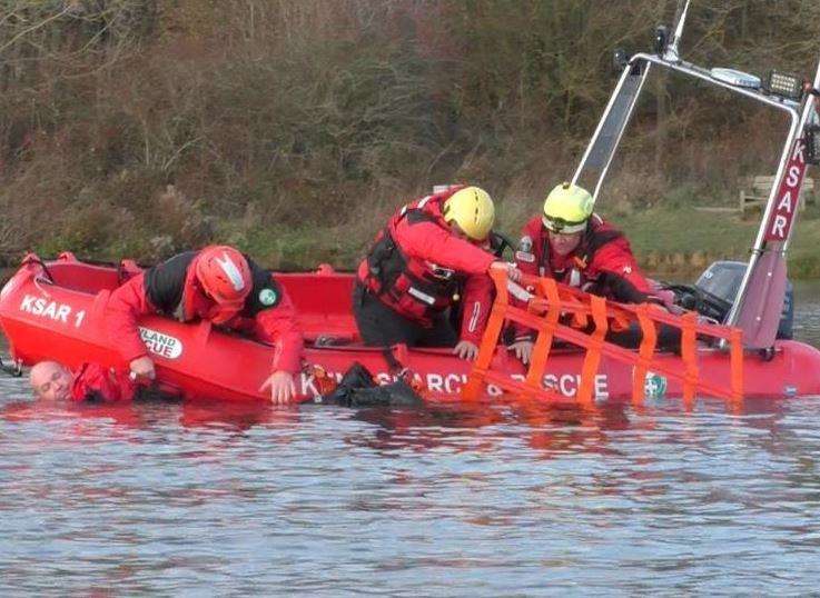The volunteers practise a river rescue