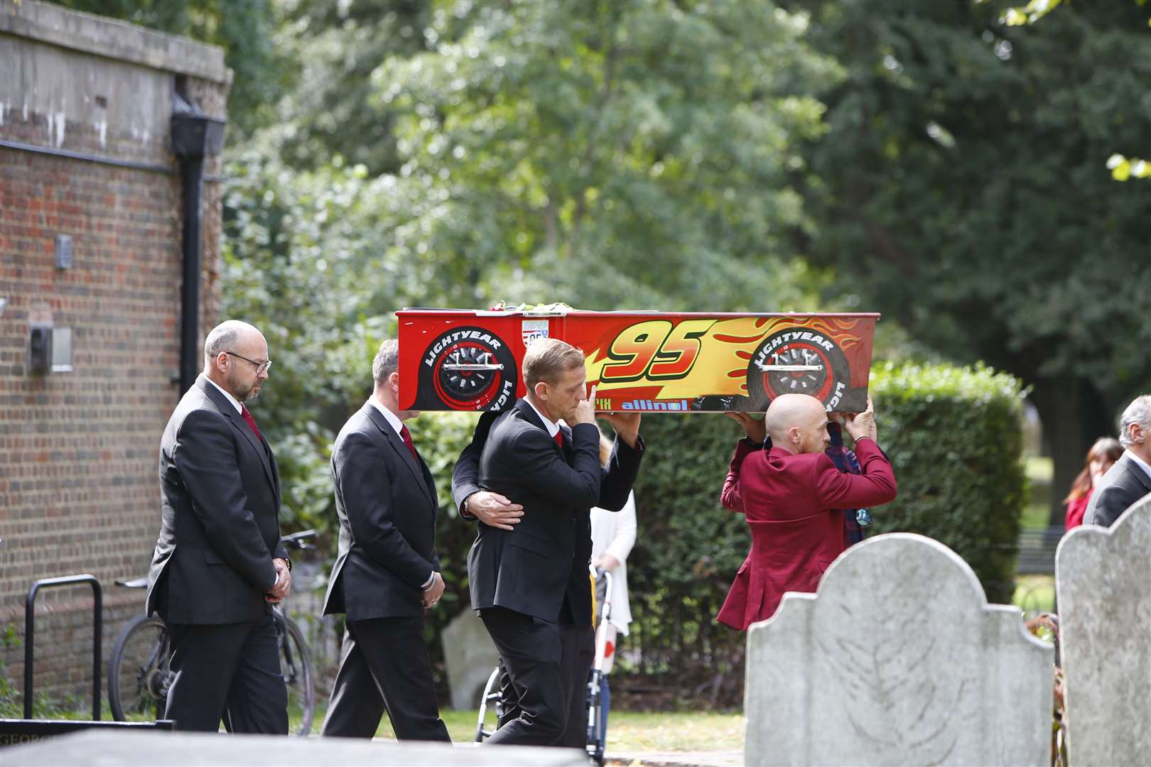 Lucas' coffin carried after the service