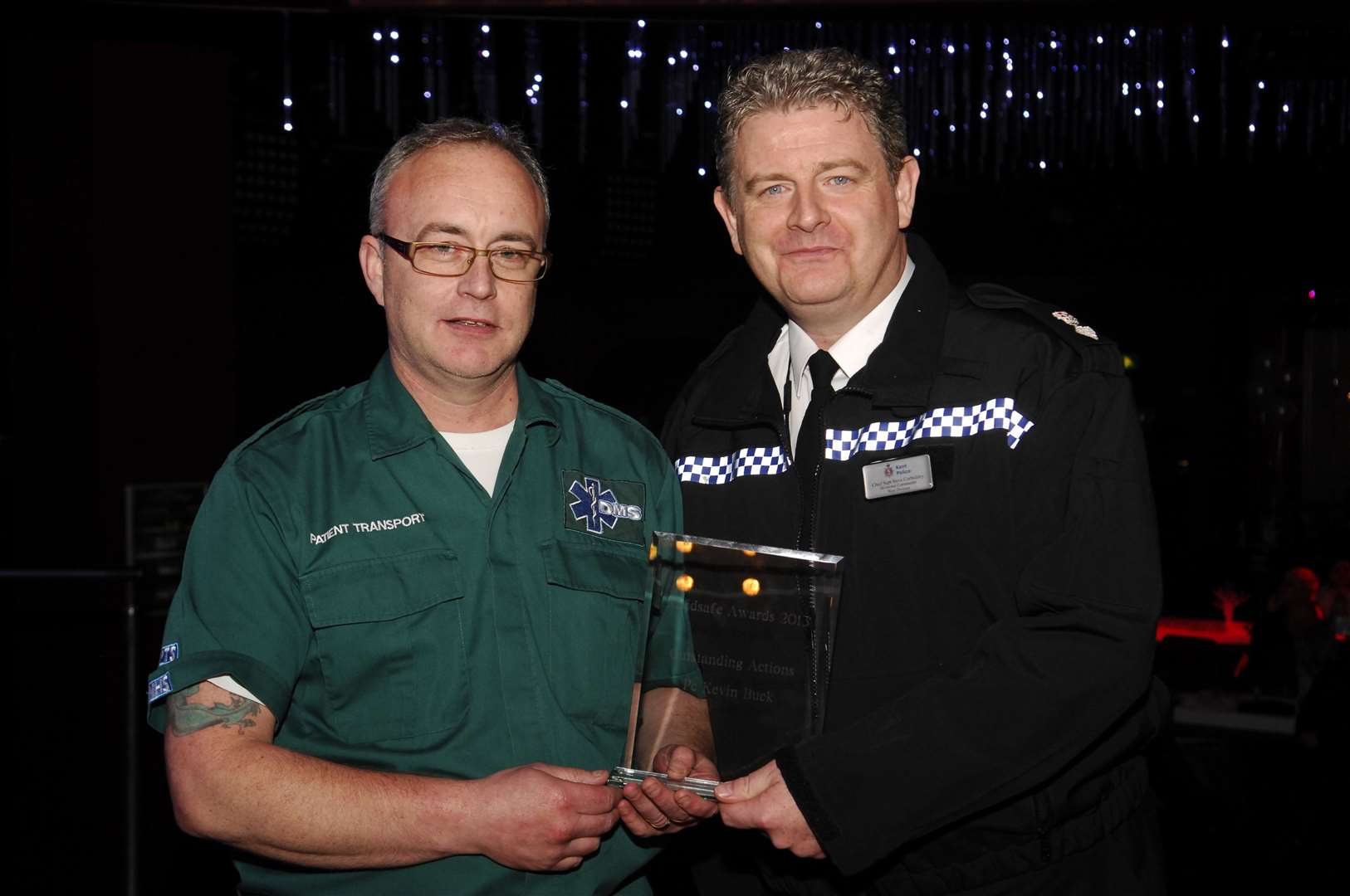 Kevin Buck getting his award from former Chief Supt Corbishley at the Maidsafe Awards Evening in 2014