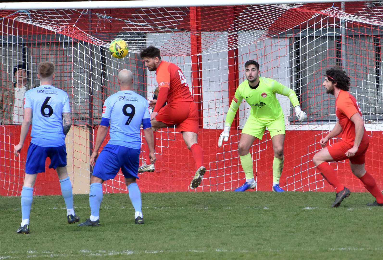 Hythe Town player-boss James Rogers heads clear during the 1-1 draw with Lancing Picture: Randolph File