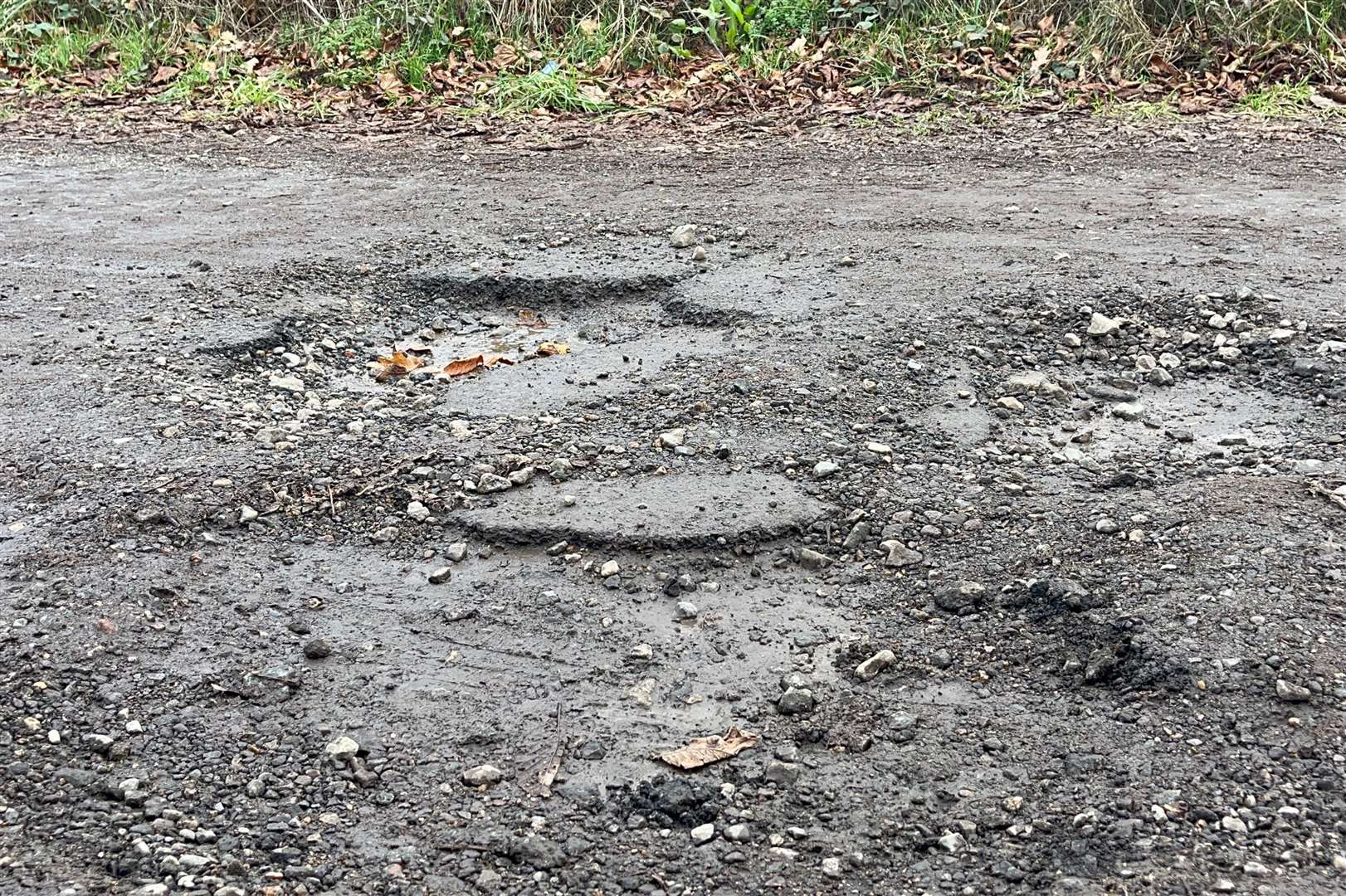 Drivers have damaged their cars on potholes in Bockhanger Lane