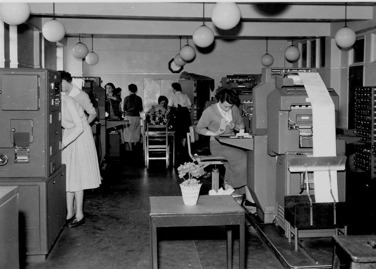 Telephone House, Canterbury, in May 1957. On the left, reported the Kentish Gazette, is the electronic multiplying punch - a version of the so-called electronic brain - and on the right the tabulator which processes the accounts