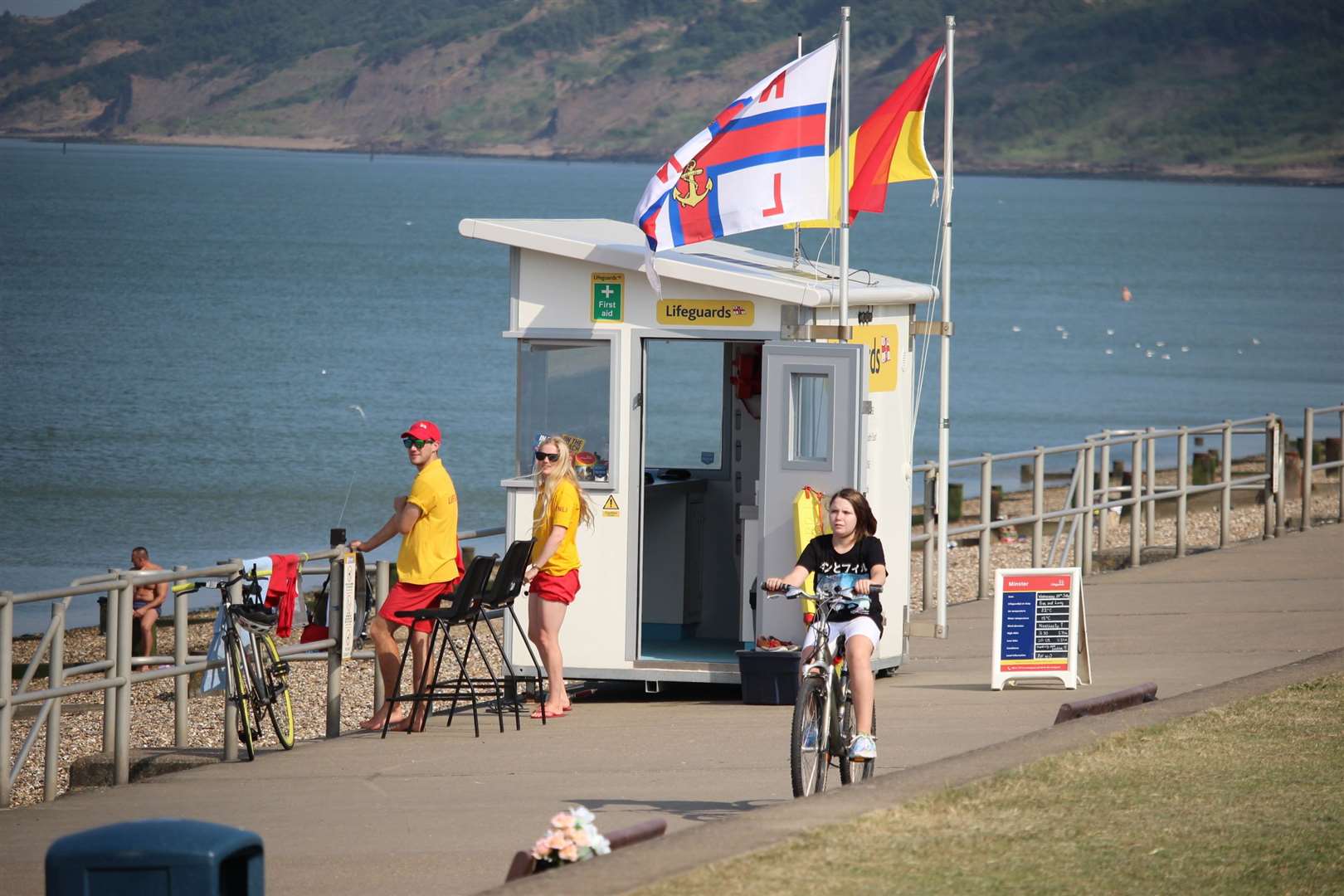 RNLI lifeguards patrolling Minster beach at The Leas on the Isle of Sheppey
