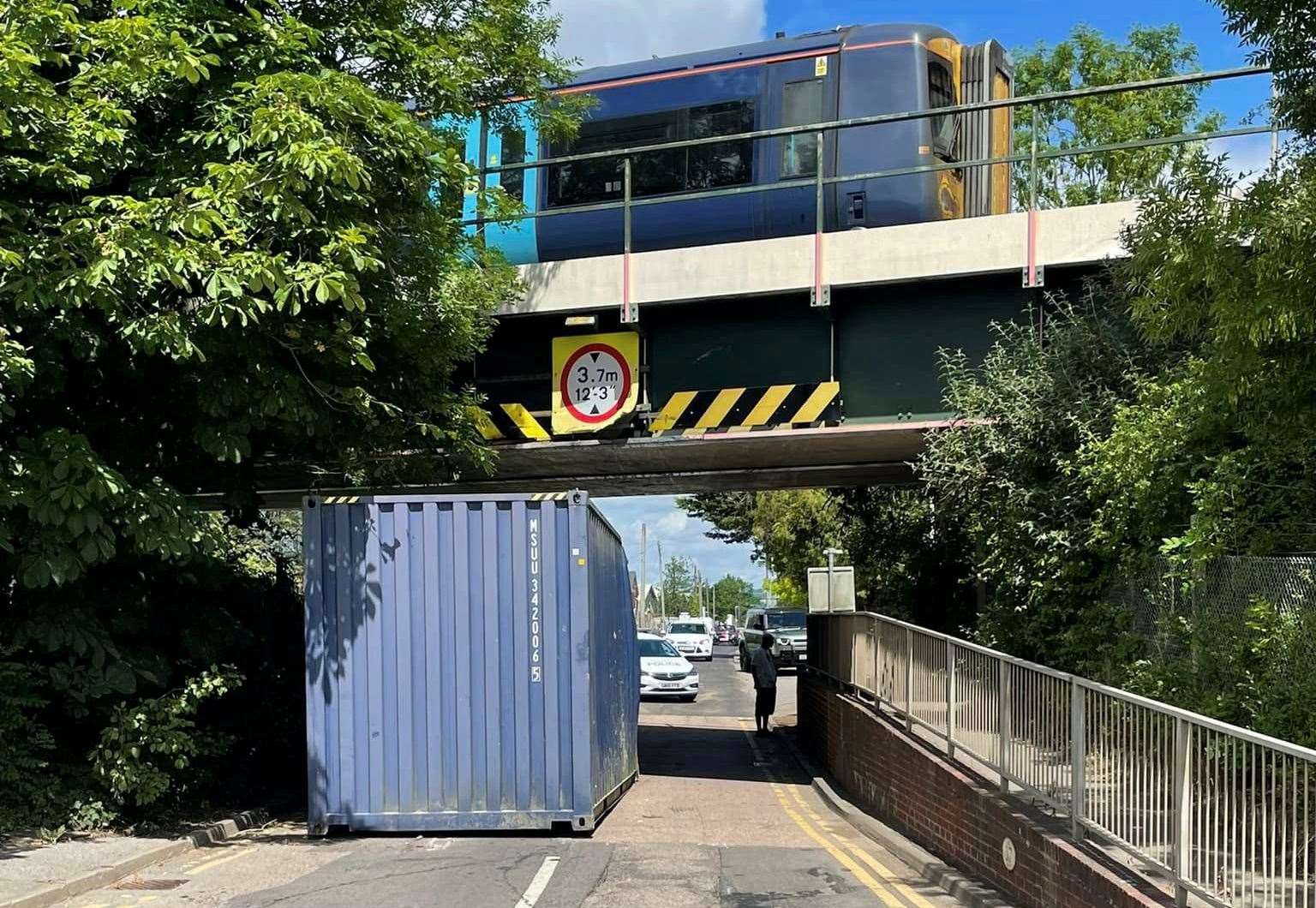 A container was knocked off the back of a lorry after it hit a railway bridge in Pattenden Lane in Marden. Picture: Marden Parish Council
