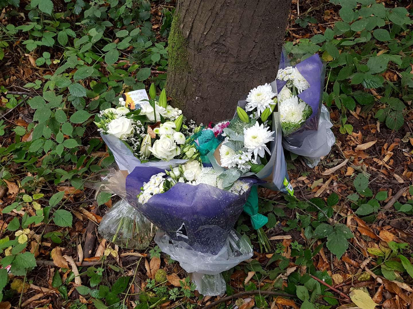 Floral tributes were left at the scene of a crash which took the life of Paul Hooker