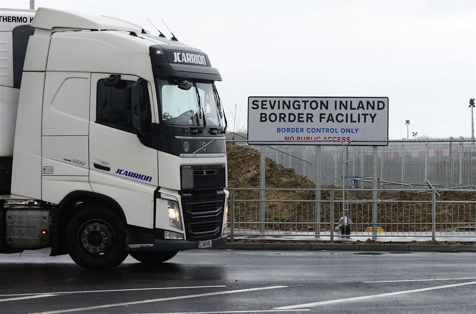 A HGV turns off the A2070 link road and enters the 66-acre site. Picture: Barry Goodwin