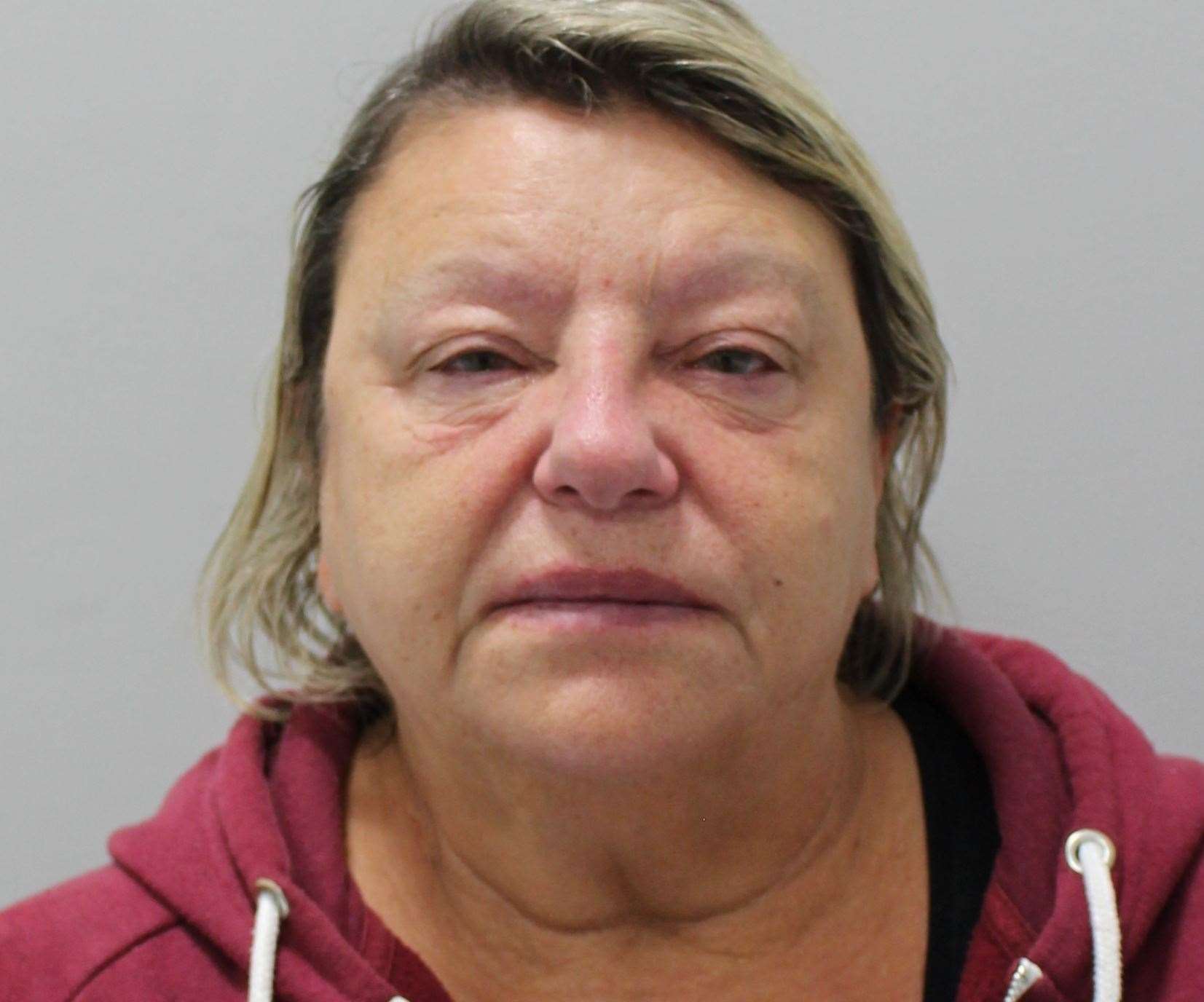 Tracey Cook tried to hide weapons and drugs in a park