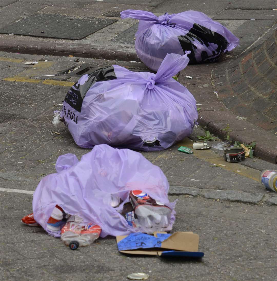 Rubbish spread across the road. Picture: Paul Amos