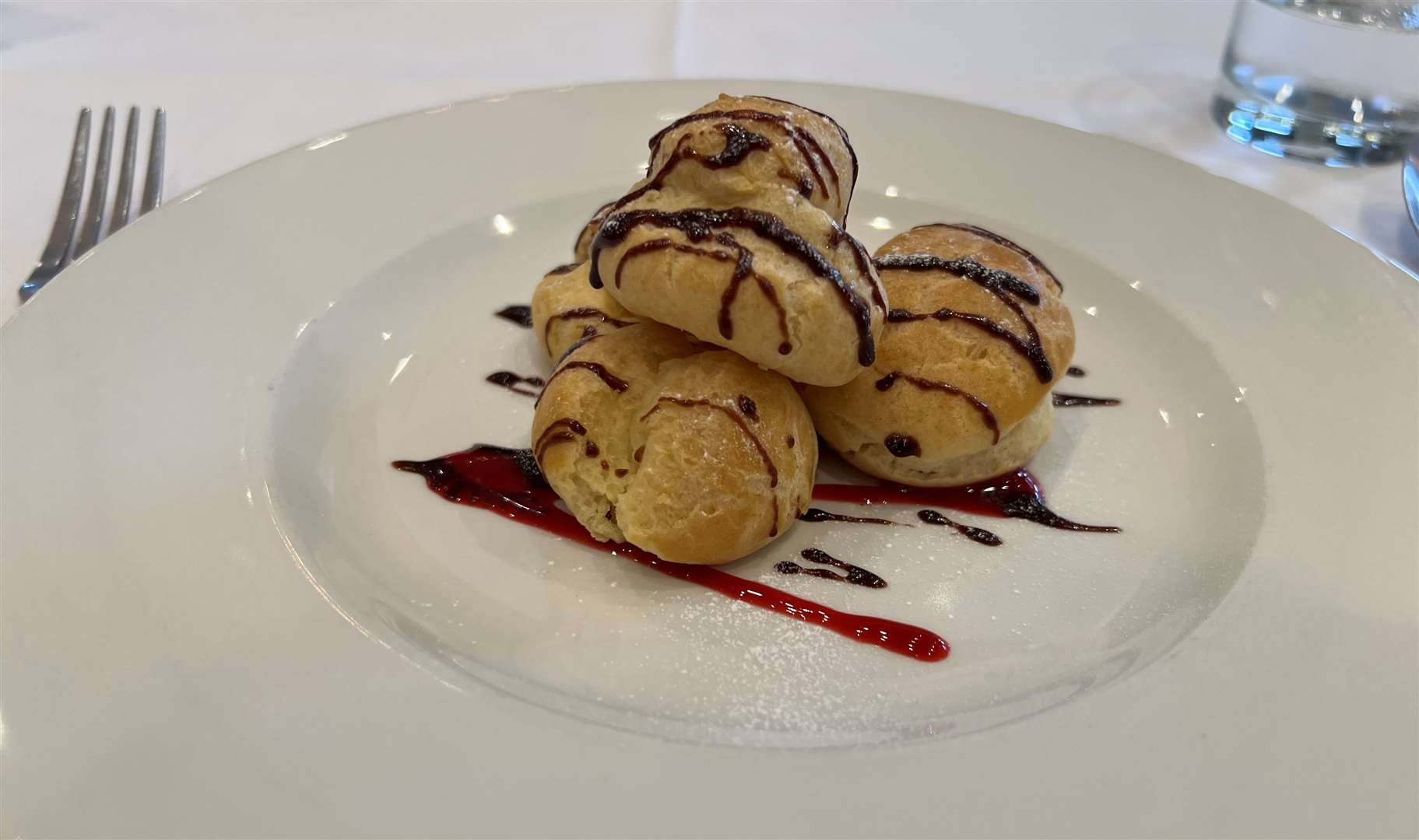 Profiteroles - hard to resist and that drizzle of raspberry was well judged
