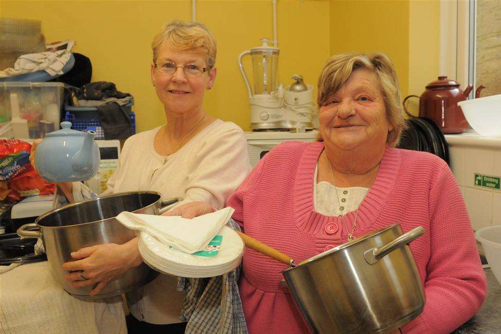 Volunteers from Crisis at Christmas in the kitchen - Marie Piper and Carol Wraight