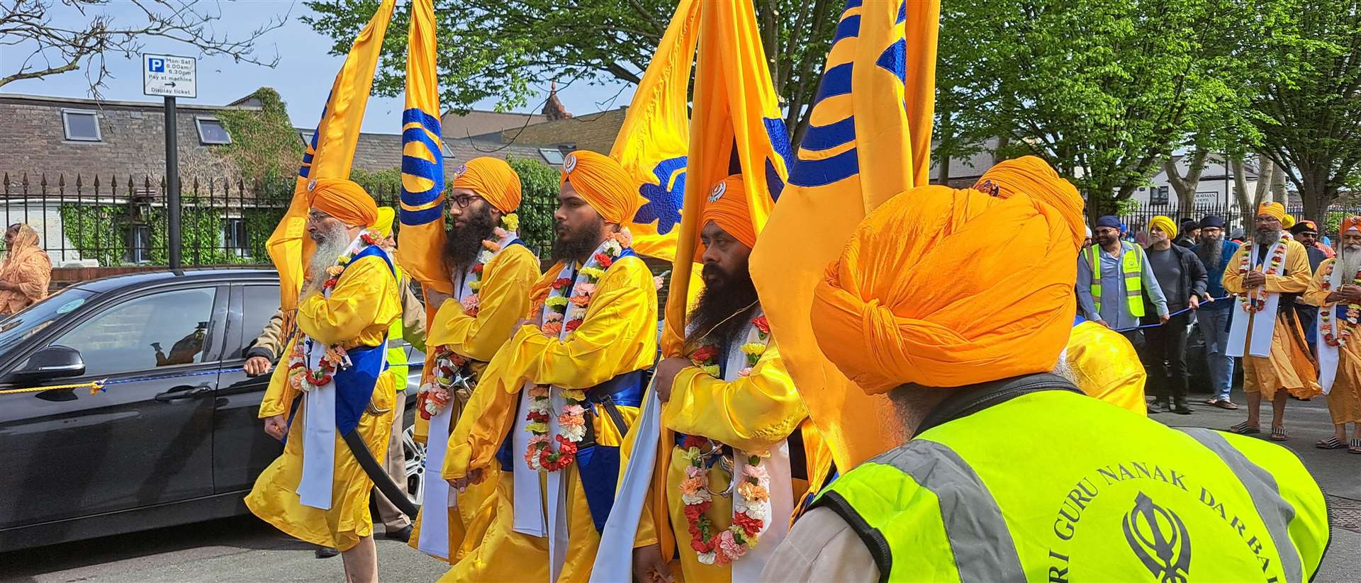 Flag bearers lead the Vaisakhi precession in Gravesend. Picture: Nikki White