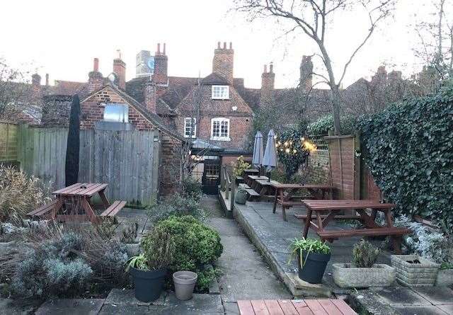 The lower level of the pub garden has been paved and the tables are equipped with umbrellas for the better weather