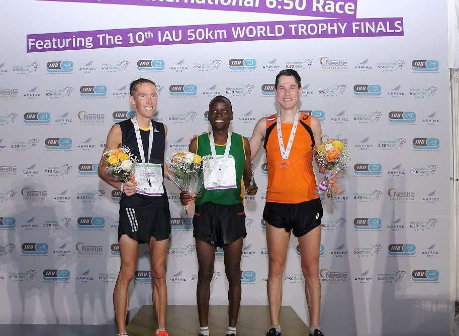 Phil Anthony (left) with winner Collen Makaza (centre) and third placed Harm Sengers .