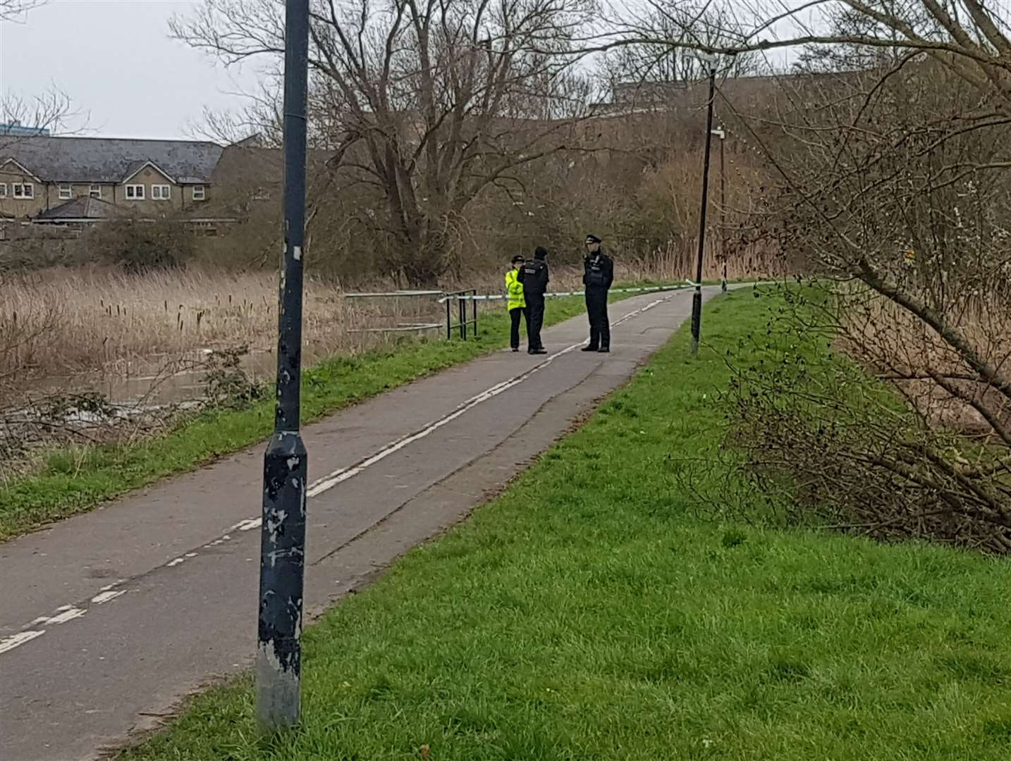 Police at the scene after Mr Limbu's body was found. Picture: Charlie Harman