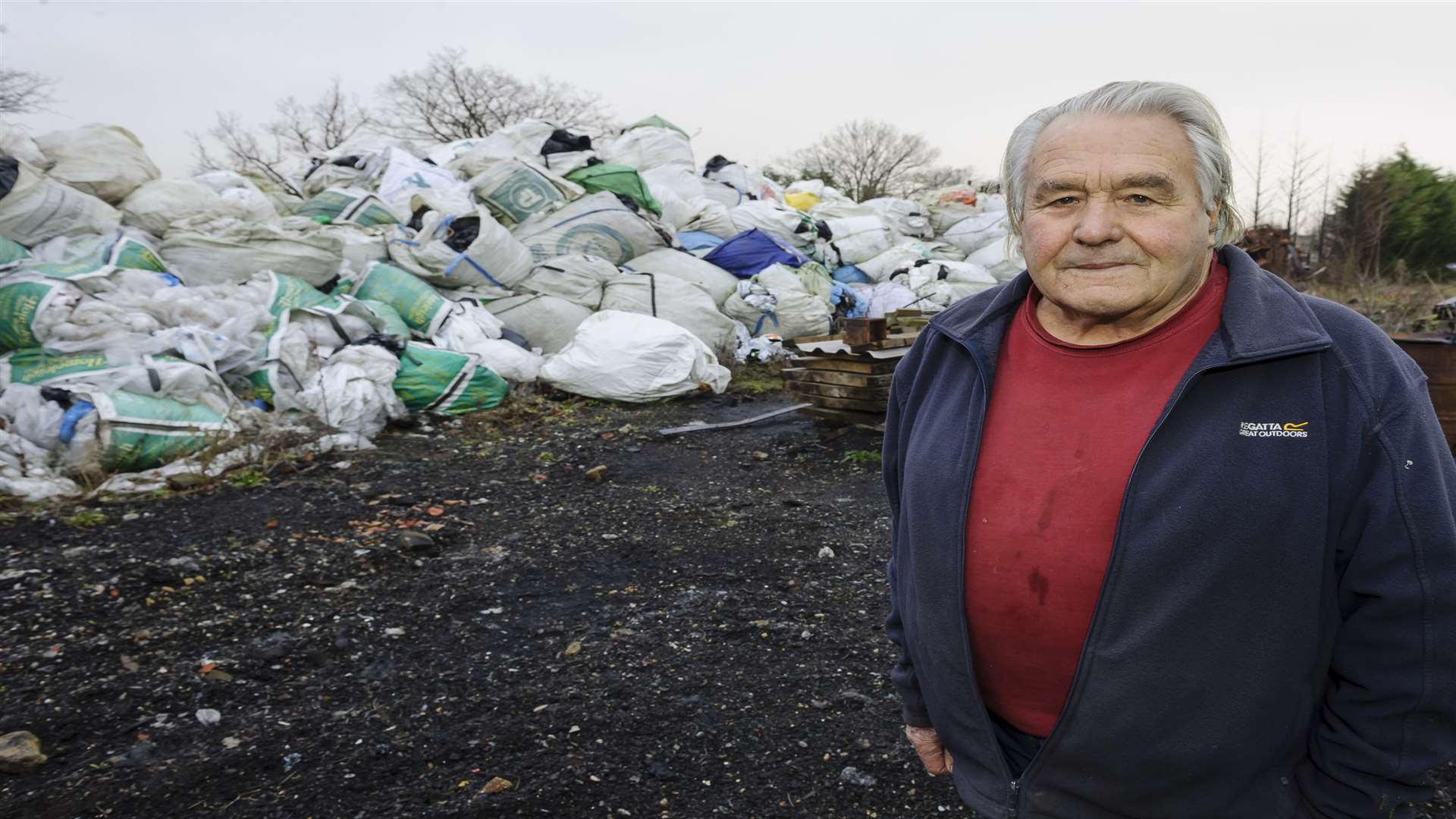 Barton Tarry says waste on his son’s land is a fire hazard