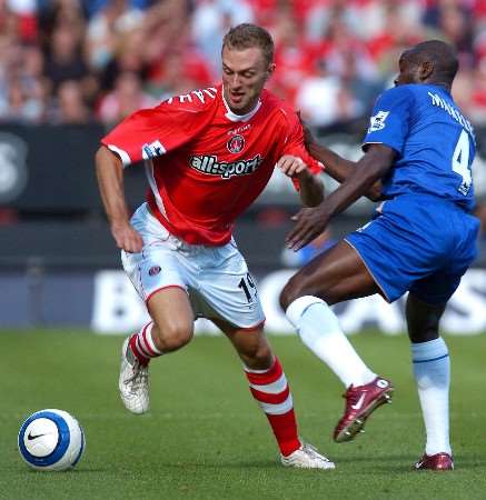 Dennis Rommedahl clashes with Claude Makelele. Picture: MATTHEW WALKER