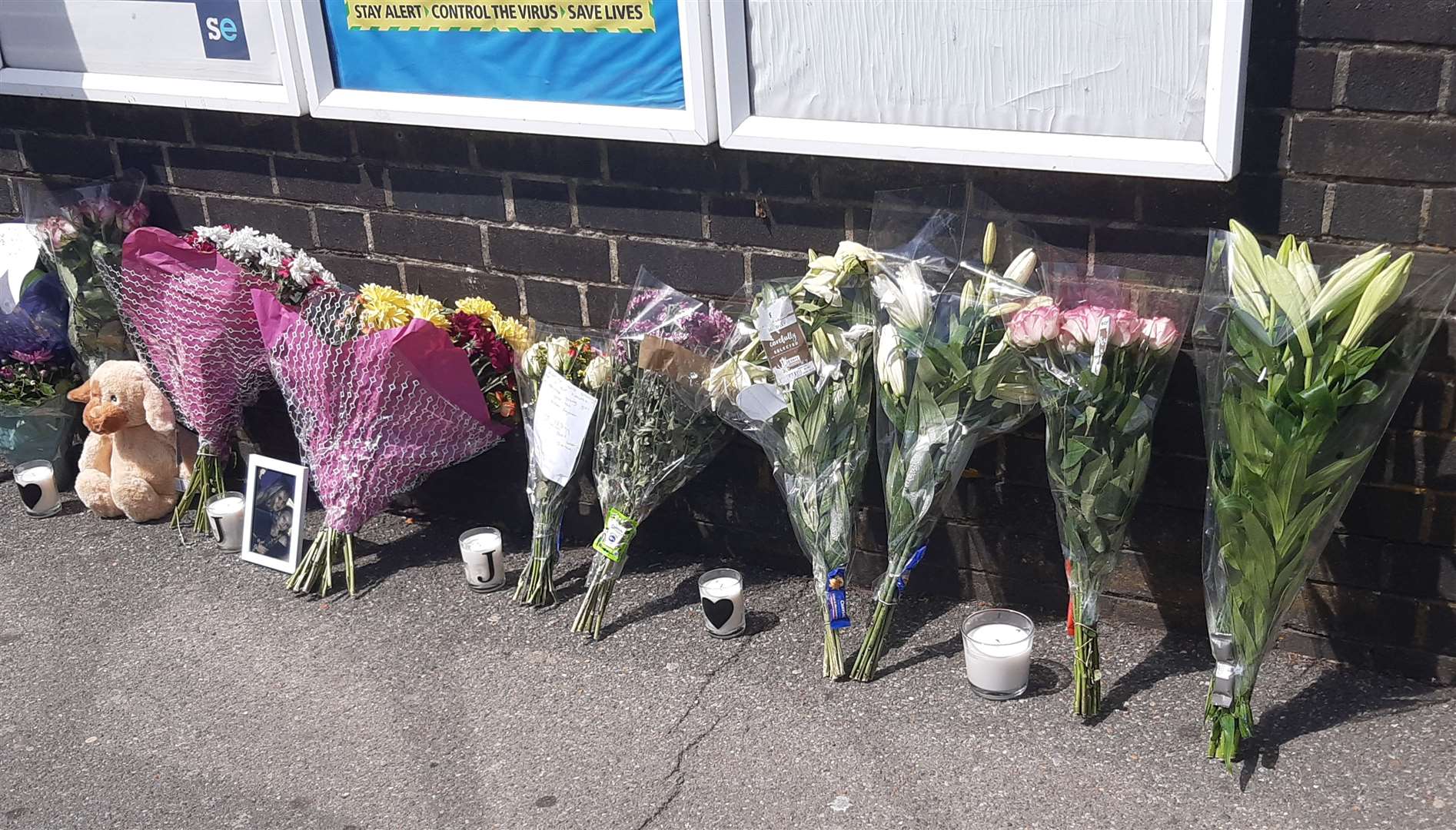 Floral tributes left outside Swanley station