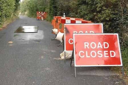 DANGER SPOT: The covered hole and the moved road closed signs. Picture: CHRIS DAVEY