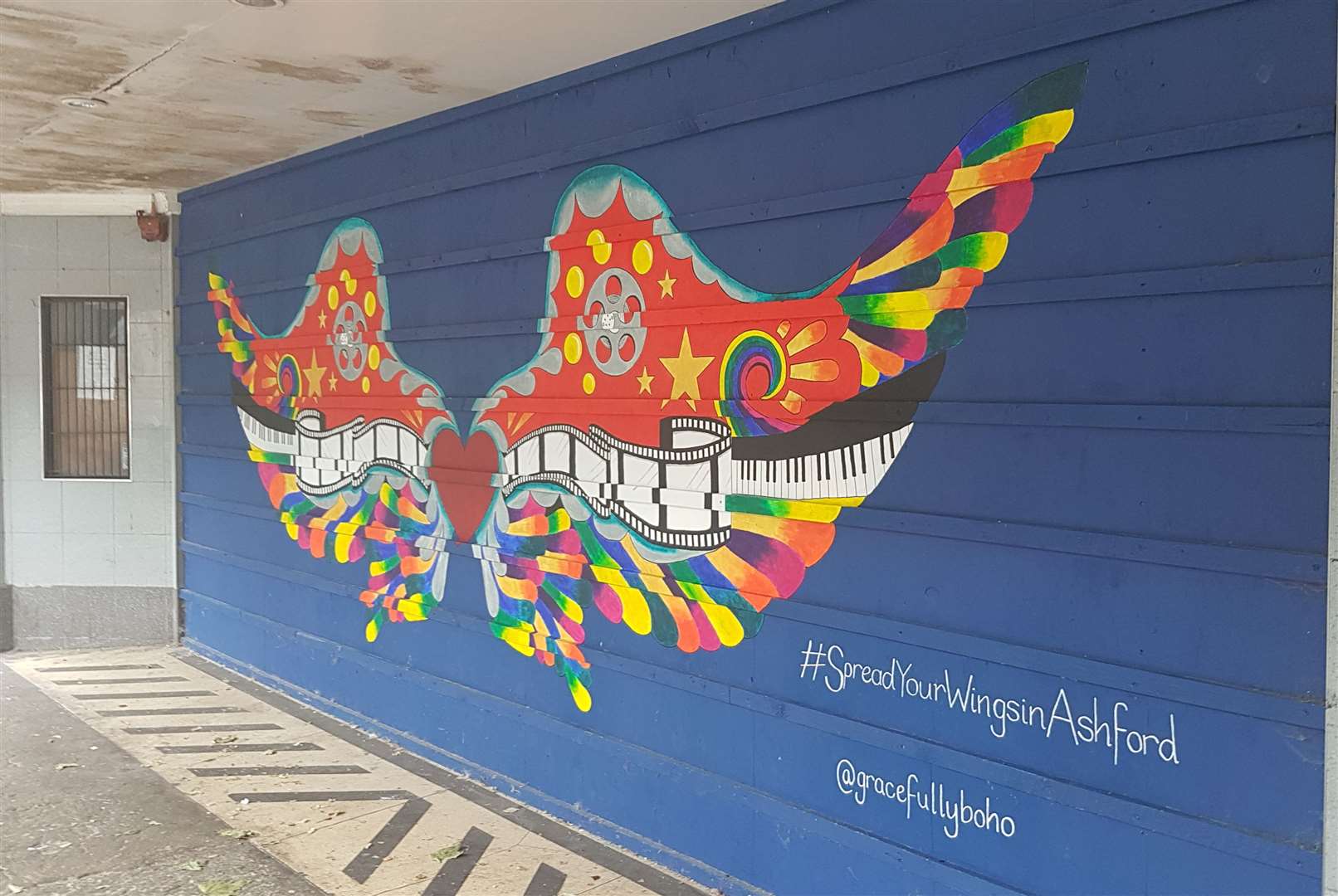 The 'spread your wings in Ashford' mural was completed last year on the former Mecca Bingo building