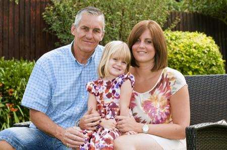 Lisa Corke with her three-year-old daughter Ellie and father Alex