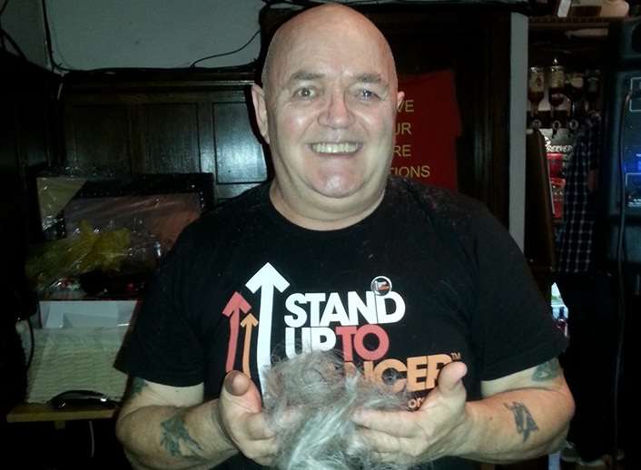 Dave Webb is battling lung cancer and shaved his head for charity