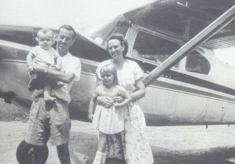 Stuart and Phyllis King, with daughter Rebecca and son John in front of MAF's first Cessna 180, in which they flew to Malakal