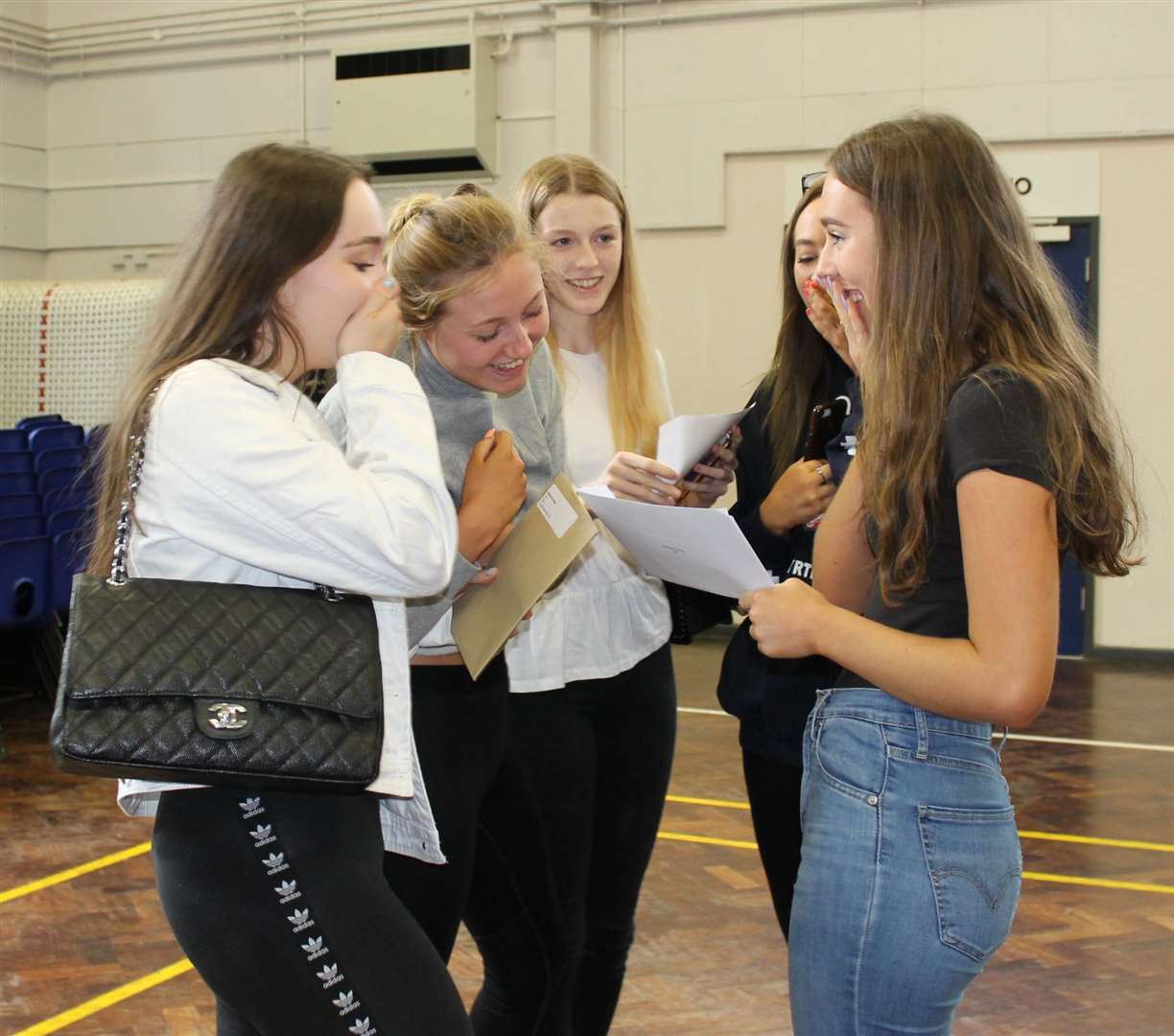 Delighted students at Wilmington grammar's sixth form WG6 open their results (15278044)