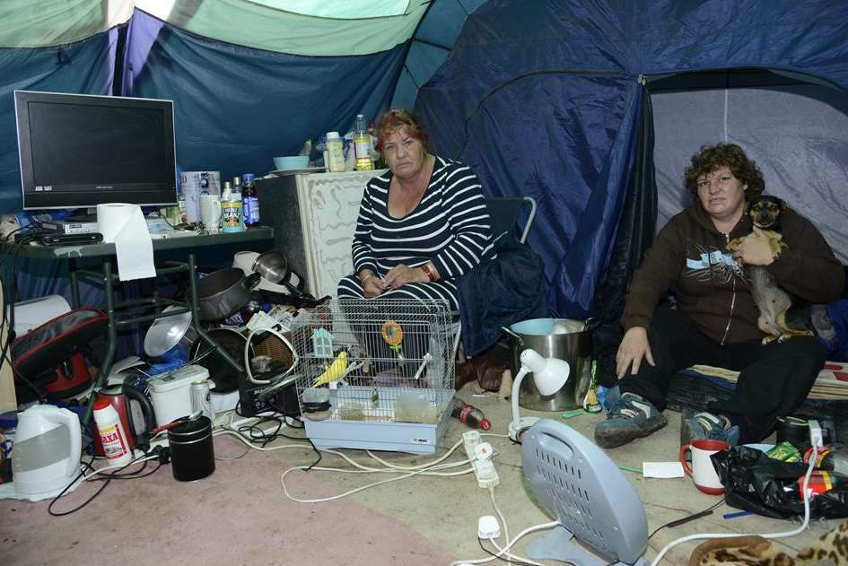 A large tent makes a makeshift home for Lorraine Botton and Naomi Barton