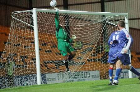 Jason Brown makes a flying save to keep Gills in the game. Picture: BARRY GOODWIN