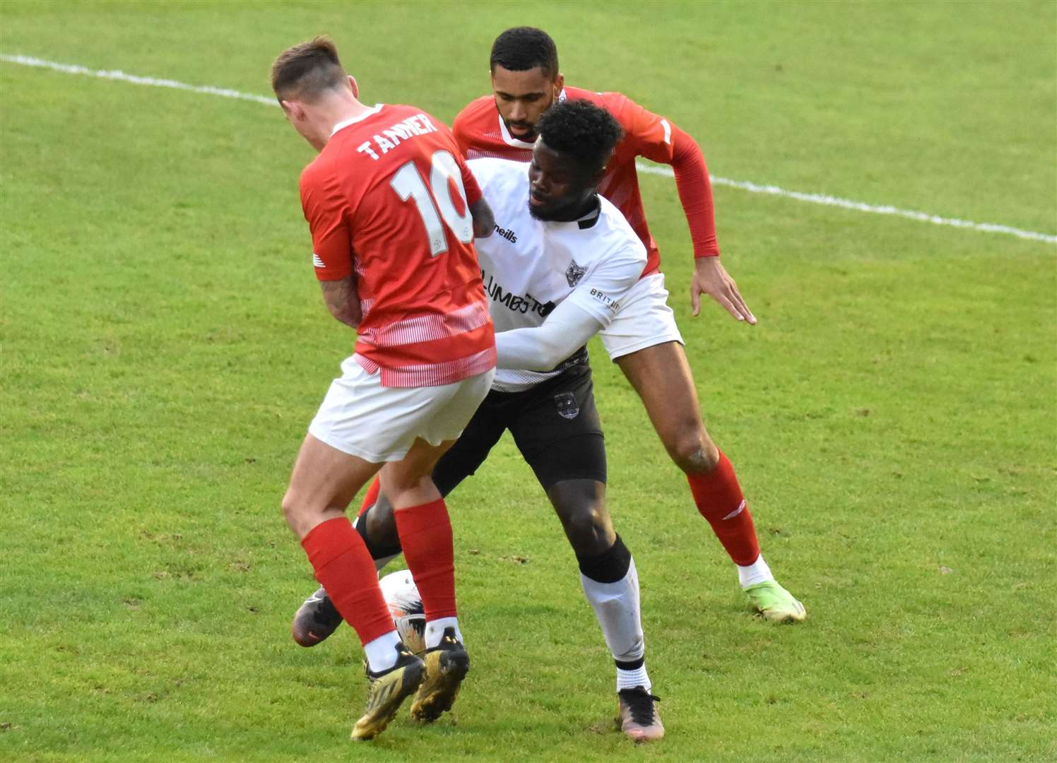 Ebbsfleet's Craig Tanner is stopped in his tracks against Weymouth's Ahkeem Rose. Picture: Ed Miller/EUFC