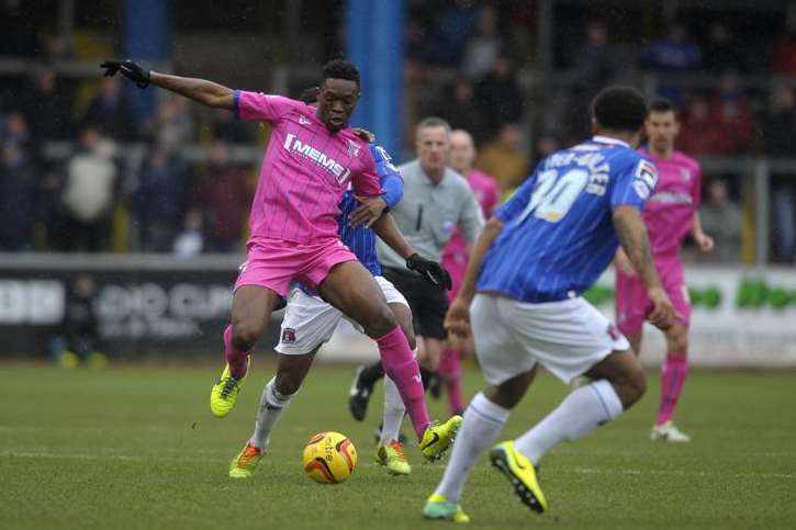 Amine Linganzi in the thick of the action against Carlisle. Picture: Barry Goodwin