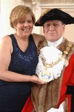 Cllr Val Goulden hands over chains of office to new mayor Cllr David Carr