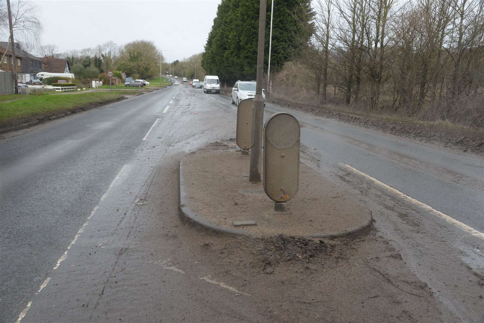 The mud covered island on London Road at Wrotham near the Invicta Business Park