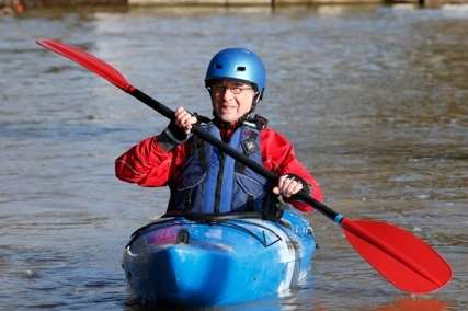 Car? What car? A canoeist finds an alternative mode of transport at Hampstead Marina in Yalding. Picture: Matthew Walker