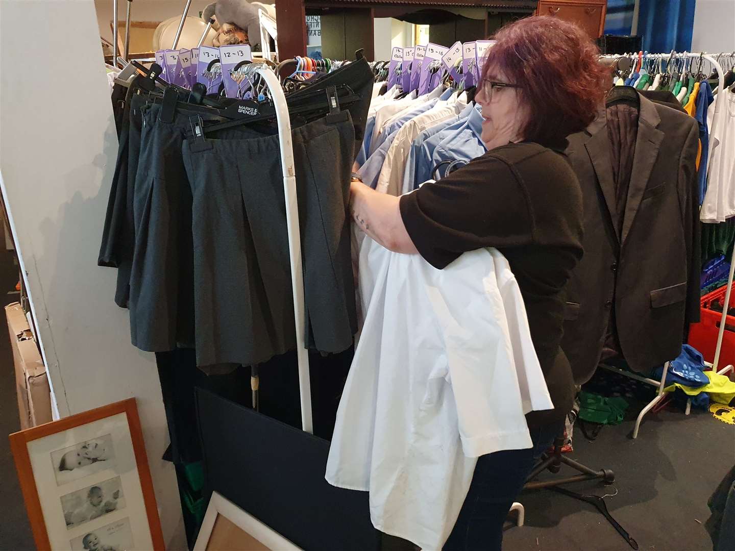 Gina Carpenter, a volunteer coordinator for Gillingham Street Angels, sorts out clothing