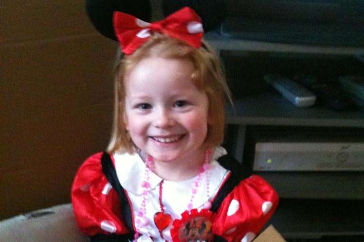 Anabelle on her fourth birthday dresses as her favourite Disney character Minnie Mouse