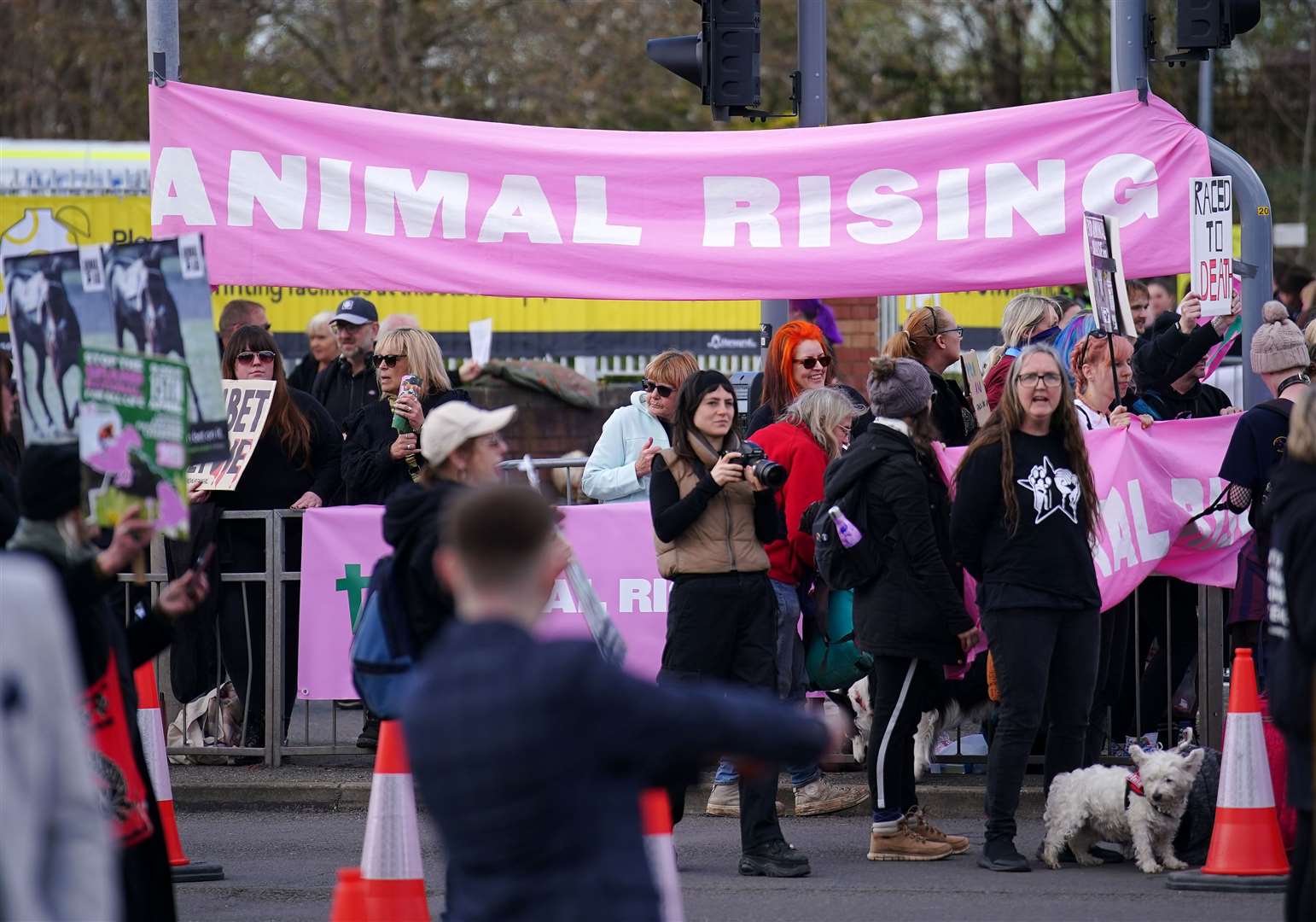 Animal Rising activists outside the gates last year (Peter Byrne/PA)