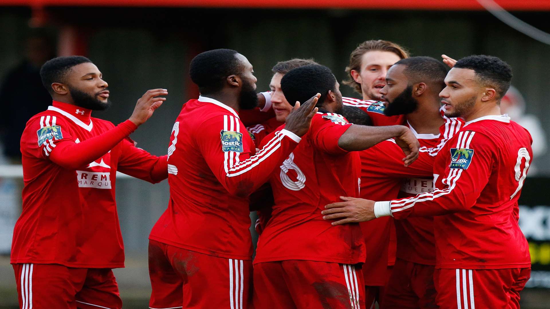 Zak Ansah (second right) celebrates with his Hythe team-mates Picture: Andy Jones