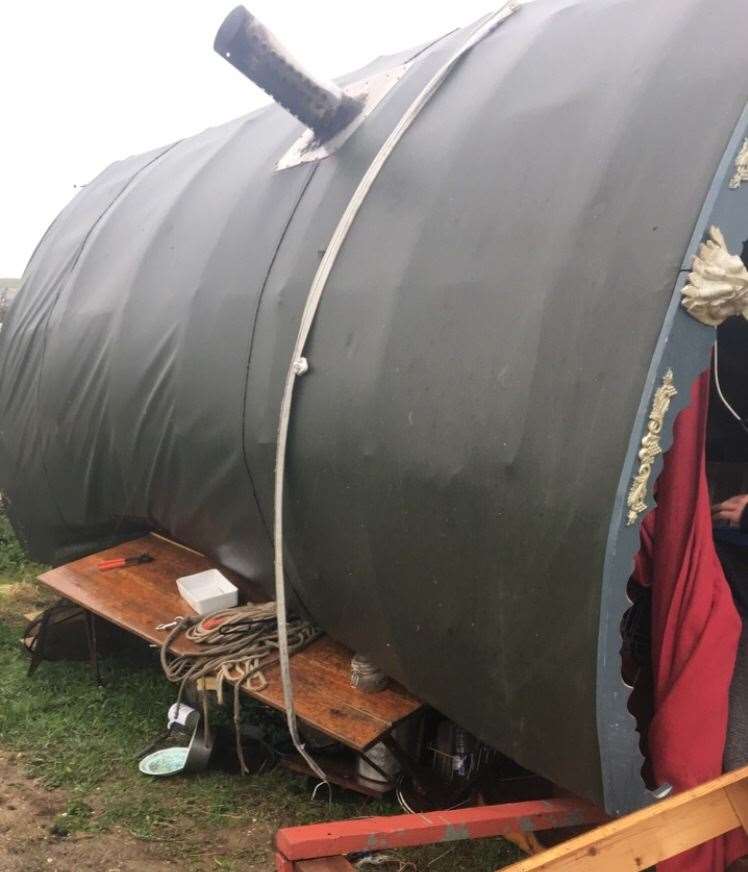 The house wagon was blown over by a freak gust of wind damaging the roof